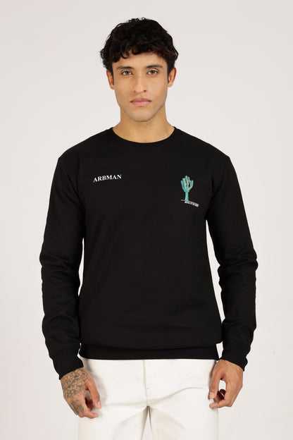 Man wearing a black long-sleeve shirt
