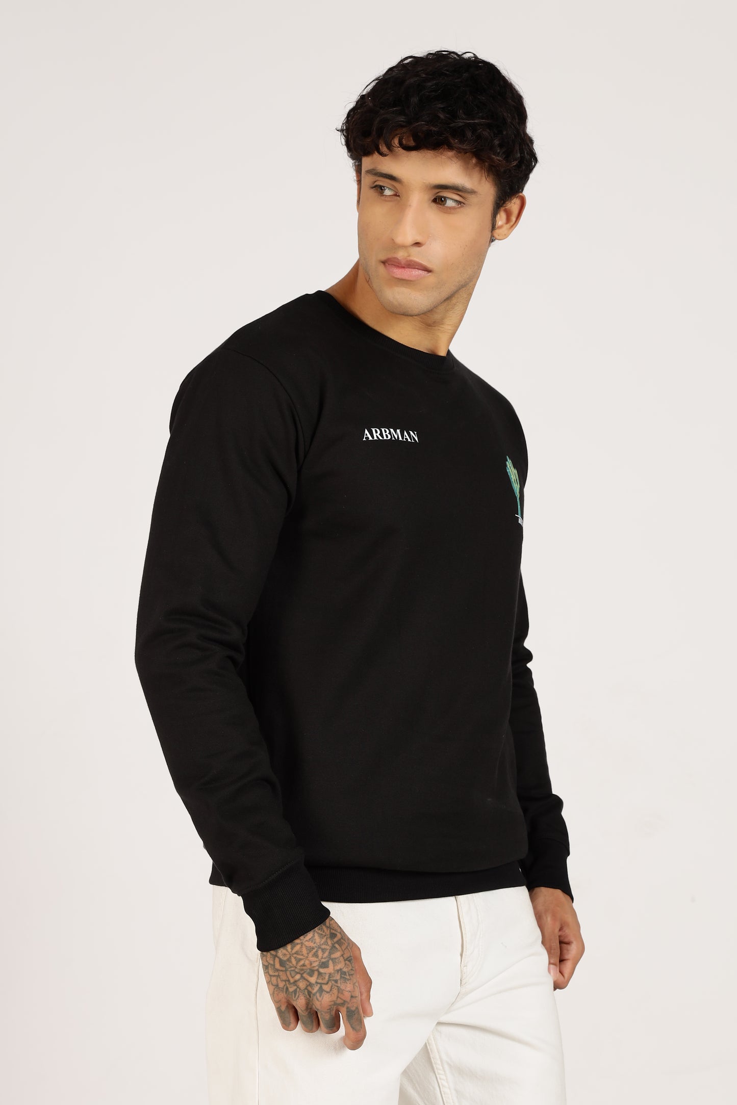 Man wearing a black long-sleeve shirt