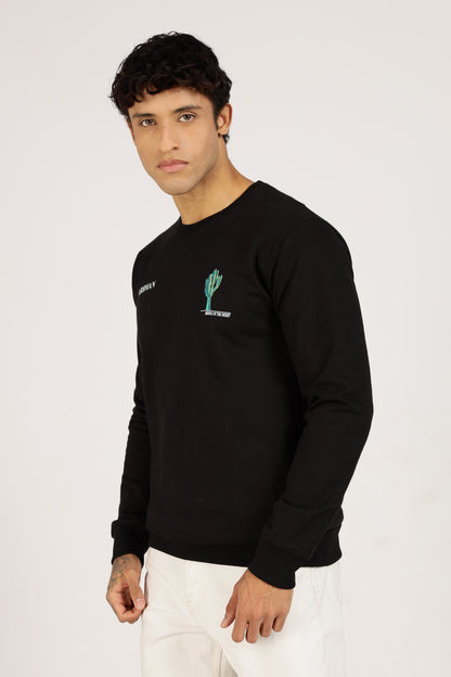 Man wearing a black long-sleeve shirt