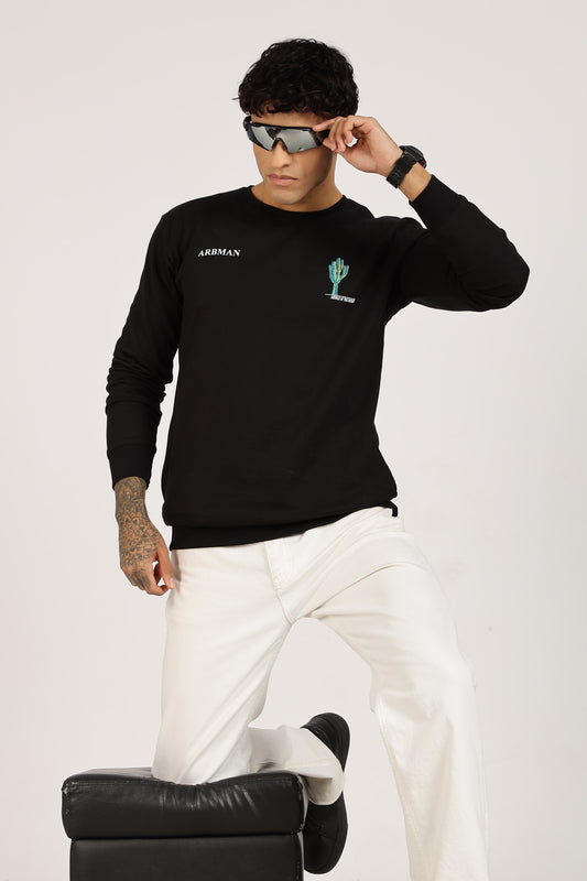 Man wearing a black long-sleeve shirt